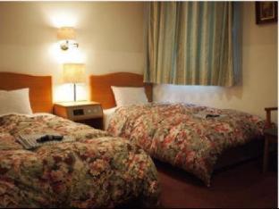 Hotel New Yutaka Izumi-Szano Szoba fotó