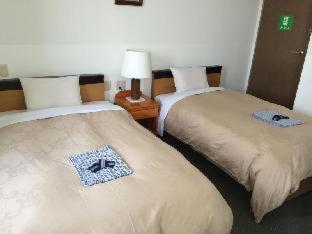 Hotel New Yutaka Izumi-Szano Szoba fotó