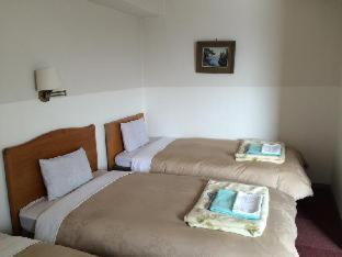 Hotel New Yutaka Izumi-Szano Szoba fotó